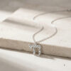 925 sterling silver dainty Chai necklace with Western Wall brick texture on travertine stone