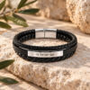 Engraved black leather bracelet with Am Yisrael Chai in Hebrew, on Jerusalem stone with olive leaves