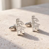 Sterling silver Hebrew name cufflinks showing the toggle clip and cutout letters on natural stone