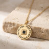 24K gold plated Nano Bible Eshet Chayil Necklace, round pendant engraved with the Hebrew Eshet Chayil (Woman of Valor) verse around a square nano Bible chip, on stone