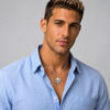 Man wearing the silver Star of David Western Wall necklace over a light blue shirt