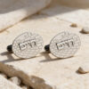 Personalized Jewish groom cufflinks in sterling silver on Jerusalem stone with a soft towel