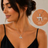 Woman wearing the sterling silver zirconia Chai necklace, with an inset showing the pendant size of 16 x 17 mm