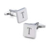 Initial engraved cufflinks with the letter T, square sterling silver pair on a white background