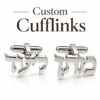 Pair of custom sterling silver cufflinks with Hebrew name cutout letters and toggle clips