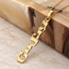 24K gold plated Custom Hebrew Name Necklace with a vertical Hebrew name pendant reading Juliet (ג'ולייט) leaning on a wood and stone block