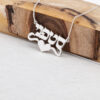 925 sterling silver Hebrew name necklace with heart hanging from wood