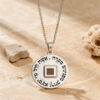 Sterling silver Nano Bible Eshet Chayil Necklace on a natural stone background, Hebrew Woman of Valor verse around a nano Bible chip