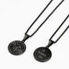 Black stainless steel compass necklace: compass front and engraved back reading