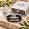 Black leather bracelet engraved Always With You beside the Gaya Judaica gift box and card, a personalized gift for him