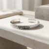 sterling silver Jerusalem Wall cuff bracelet with Hebrew engraving on light stone