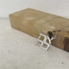 925 sterling silver stacked Ahava Hebrew love necklace leaning on an onyx stone block