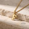 14K Gold Dainty Initial Necklace Tiny Letter Charm — main photo, handmade in Israel
