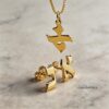 14K Gold Hebrew Letter Jewelry Set Necklace Earrings — top-down view, handmade in Israel