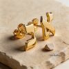 14K Gold Hebrew Letter Stud Earrings — top-down view, handmade in Israel
