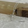 Cross pendant gift packaging — Israeli artisan piece.