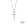 Petite cross necklace shown layered with another chain.