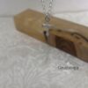 Dainty cross pendant packaging — Israeli artisan piece.