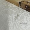 Pavé Cross Pendant lifestyle shot — everyday Christian jewelry.