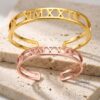 Couple Roman Numeral Cuff Bangle Set of Two — natural light shot, handmade in Israel