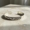 Personalized Sterling Silver Cuff Bracelet Hebrew Verse — dark surface composition, handmade in Israel