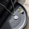 Custom Engraved Round Stainless Steel Pendant Necklace — top-down view, handmade in Israel