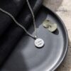 Custom Engraved Round Stainless Steel Pendant Necklace — top-down view, handmade in Israel