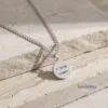 Custom Engraved Round Stainless Steel Pendant Necklace — styled shot, handmade in Israel