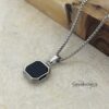 Engraved Black Onyx Tag Necklace Stainless Steel — styled shot, handmade in Israel
