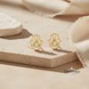 Hamsa Stud Earrings — warm-tone styled, handmade in Israel