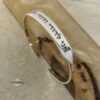 Personalized Sterling Silver Hebrew Cuff Bracelet — top-down view, handmade in Israel