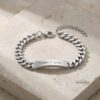 Hebrew Engraved Cuban Link Bracelet Stainless Steel ID Jewelry — three finishes side by side, handmade in Israel