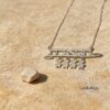 Hebrew Name Necklace with Baby Charms — three finishes side by side, handmade in Israel