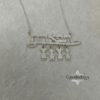 Hebrew Name Necklace with Baby Charms — top-down view, handmade in Israel