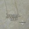 Hebrew Name Necklace with Baby Charms — close-up detail, handmade in Israel