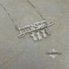 Hebrew Name Necklace with Baby Charms — styled shot, handmade in Israel