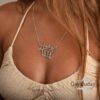 Hebrew Name Necklace with Baby Charms — warm-tone styled, handmade in Israel
