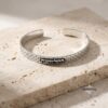 Sterling Silver Jerusalem Wall Cuff Bracelet Engraved — top-down view, handmade in Israel