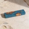 Olive Wood Mezuzah Case with Blue Epoxy — staged view, handmade in Israel