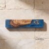 Olive Wood Mezuzah Case with Blue Epoxy — warm-tone styled, handmade in Israel