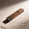Olive Wood Mezuzah Case Gray Epoxy — styled shot, handmade in Israel