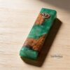 Handmade Olive Wood Mezuzah with Turquoise Epoxy — close-up detail, handmade in Israel