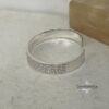 Eshet Chail Hebrew Bangle Sterling Silver — styled shot, handmade in Israel