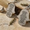 Personalized Hamsa Keychain Hebrew Engraved — dark surface composition, handmade in Israel