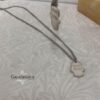 Shema Israel Hamsa Pendant Stainless Steel — natural light shot, handmade in Israel