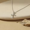 Sterling Silver Cross Necklace Pavé Zirconia — natural light shot, handmade in Israel