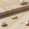 Tiny Hebrew Name Necklace Sterling Silver — styled shot, handmade in Israel