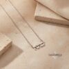 Tiny Hebrew Name Necklace Sterling Silver — staged view, handmade in Israel