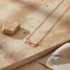 Tiny Hebrew Name Necklace Sterling Silver — natural light shot, handmade in Israel