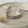 Unique Hebrew Sterling Silver Cuff Bracelet Matte — styled lifestyle, handmade in Israel